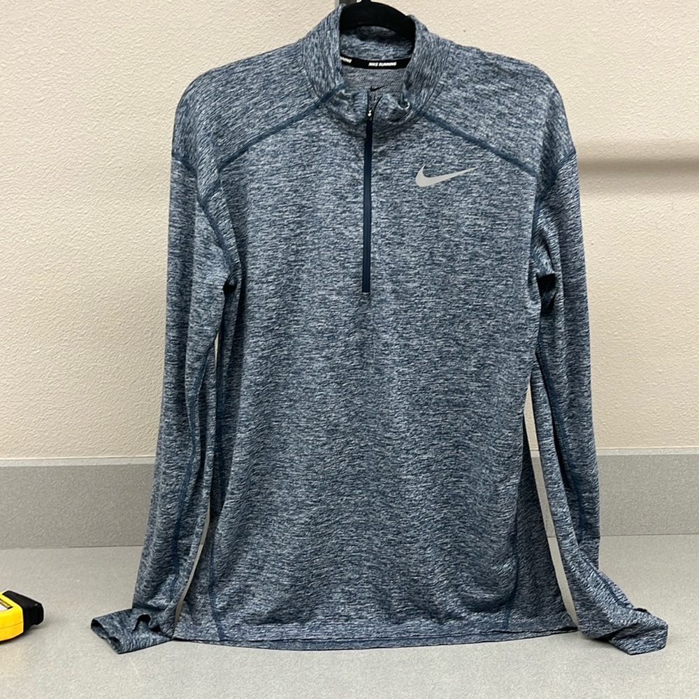 Nike dri fit.  Size M